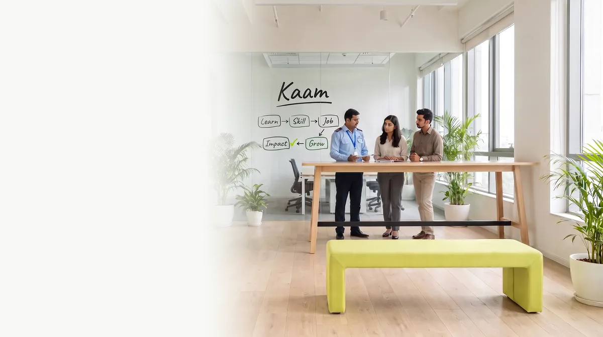 A team planning a programme at a standing table, a Kaam flow chart drawn on the glass behind them